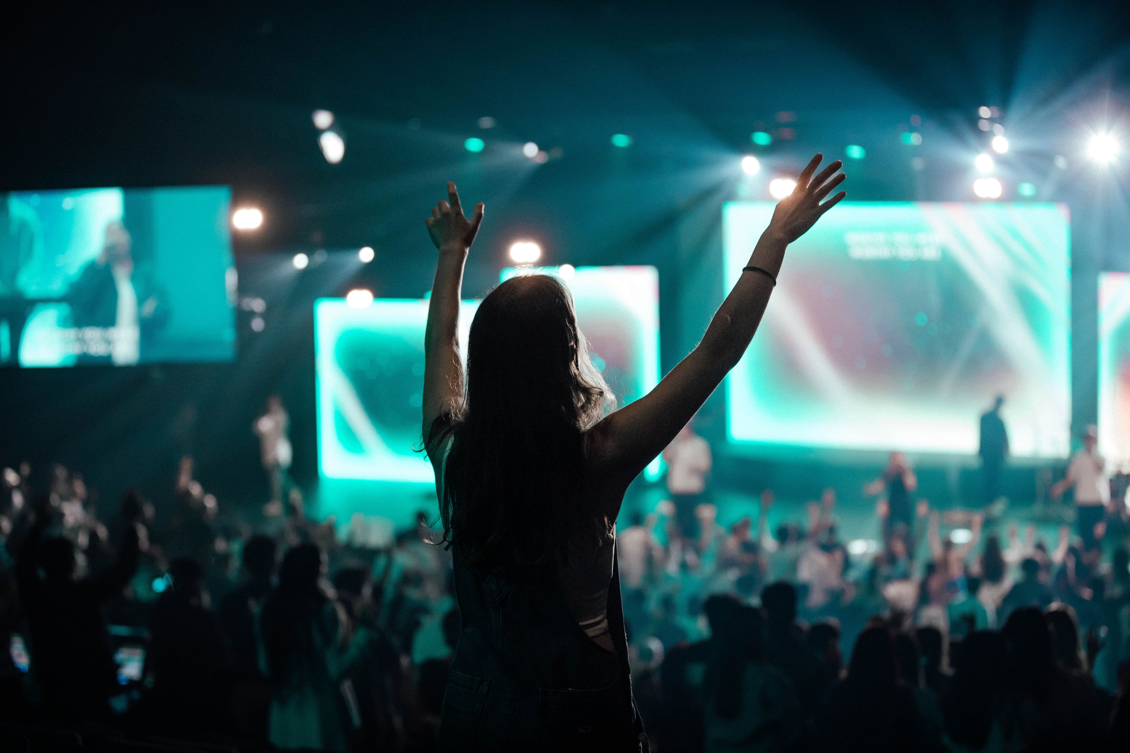 Person worshipping at church